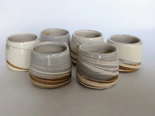 Handmade white marbled ceramic tumbler for slow living and daily rituals