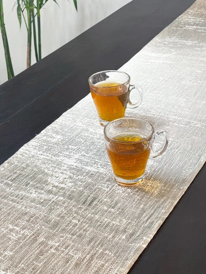 Neutral handspun cotton table runner for slow living and ritual spaces
